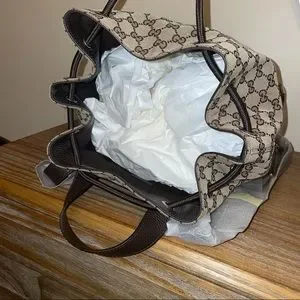 Gucci | Bags | New Gucci Gg Monogram Drawstring Backpack  display picture 1